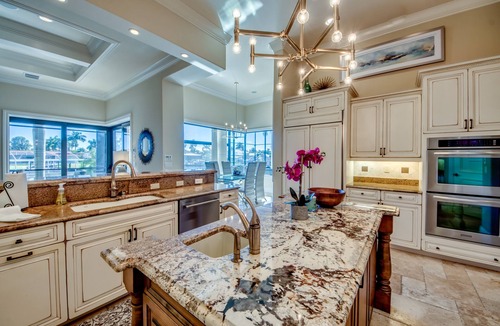 Pelican Villa | Gulf Access Canal - Heated Pool & 2 Spas - Theatre - Rooftop overlook firepit