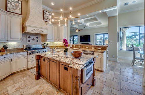 Pelican Villa | Gulf Access Canal - Heated Pool & 2 Spas - Theatre - Rooftop overlook firepit