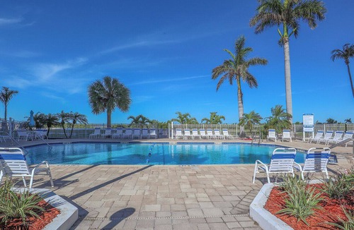 South Island Condo | Hello Sunshine! Tropical Island Beachfront Getaway Condo With Amazing Sunset Views From Balcony!