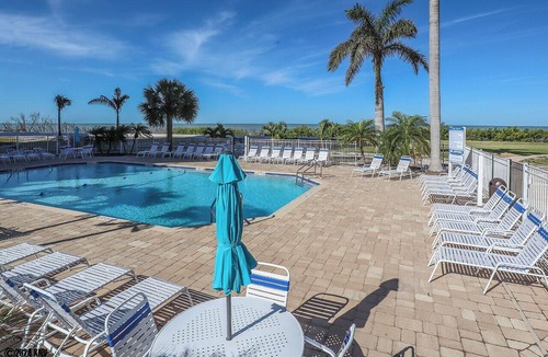 South Island Condo | Hello Sunshine! Tropical Island Beachfront Getaway Condo With Amazing Sunset Views From Balcony!