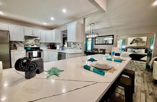 Seminole House | HOME SWEET HOME!☀️ HUGE HOT TUB. HEATED POOL! 7 miles to beach 4BD 2BA updated!