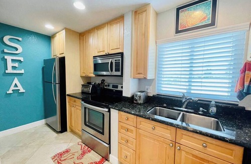Capri Isle Condo | Inter-coastal Piece of Paradise - Walk to Beach