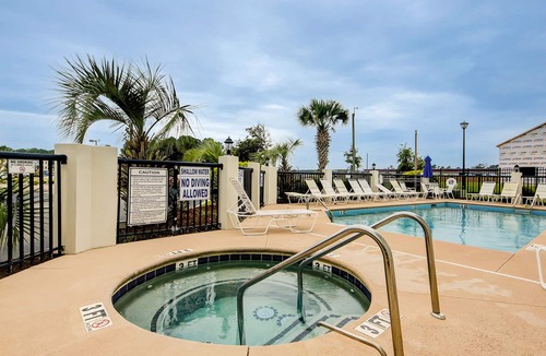 Carolina Yacht Landing Condo | Lakefront condo with private patio, pool, close to beach