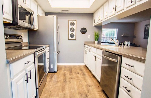 Saddlebrook Condo | Lakeview Townhome Retreat | Workspaces & Patio | Optional Saddlebrook Resort Amenities