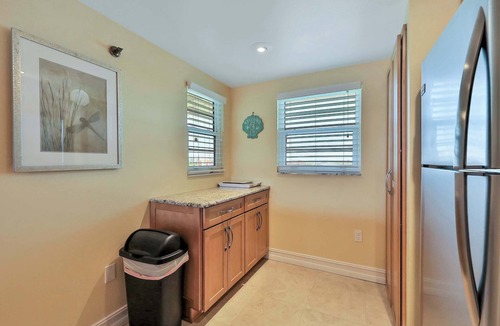 Indian Shores Condo | Light and airy condo with balcony pool hot tub and beach access
