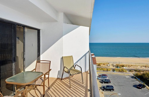 Rehoboth Beach Condo | LINENS & DAILY ACTIVITIES INCLUDED! OCEANFRONT/BOARDWALK BUILDING W/ROOFTOP POOL Furnished for comfort after a day in the sun. Relax in this 1100 sq ft unit with great southern exposure and lovely ocean views