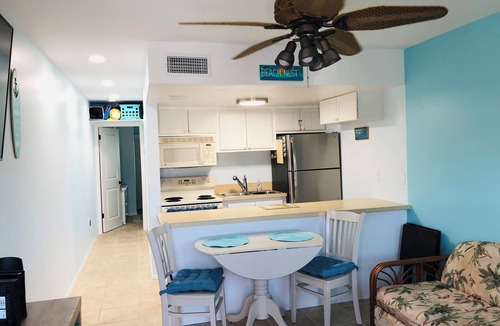 Sunset Beach Condo | Loved by you,guests.”Close to the white sandy beach,pool on site & CLEAN unit”.