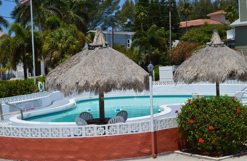 Sunset Beach Condo | Loved by you,guests.”Close to the white sandy beach,pool on site & CLEAN unit”.