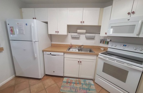 Tierra Verde Condo | Lovely 1st Floor, 1 BR condo with garden, pool and water view in Tierra Verde