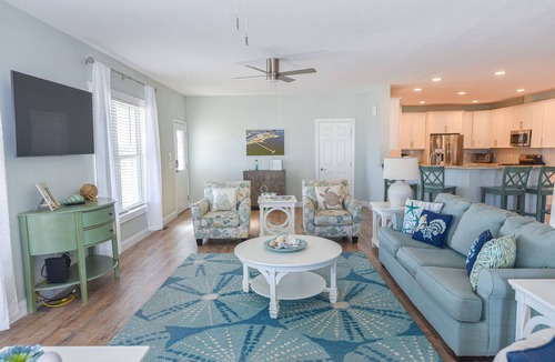 Long Neck House | Lovely home, wraparound porch, waterfront, pools, beach, pet friendly!