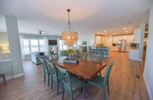 Long Neck House | Lovely home, wraparound porch, waterfront, pools, beach, pet friendly!