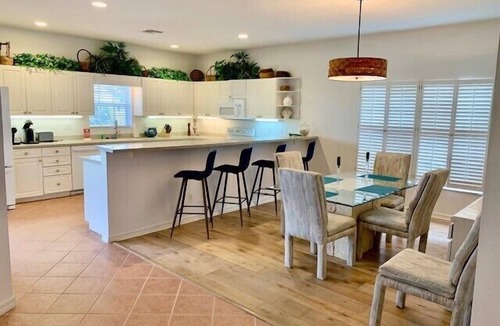 The Dunes House | Lovely pool home with golf course views in The Dunes community