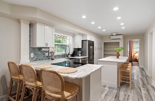 Clearwater House | Luxury 5BR w 7 beds + Mini Golf + Heated Pool + Game Room