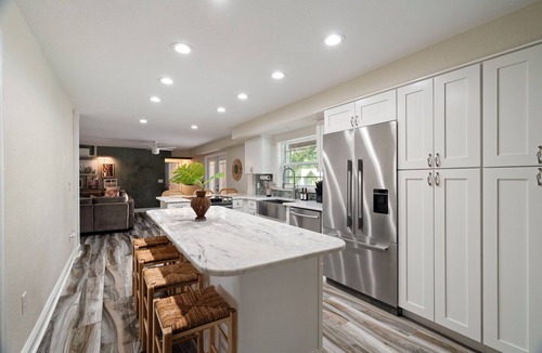 Clearwater House | Luxury 5BR w 7 beds + Mini Golf + Heated Pool + Game Room