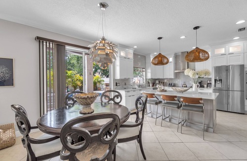 Trailer Estates House | Luxury Escapes Home with Heated Pool & Spa Near IMG and Siesta Key Beach.
