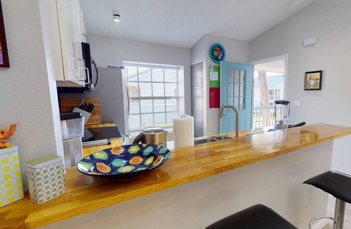 Capri Isle Condo | Modern Townhouse Easy Walking Distance to the Beach. Large Private Rec Room. Pool. Great Location.