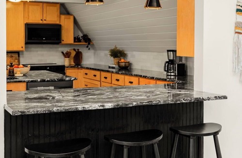Conestoga House | Modern Wooded A-Frame Expansive Backyard Firepit & Family-Friendly Retreat