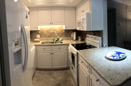 Indian Shores Condo | NEW POOL AND TENNIS COURTS NEW —-Beach available.