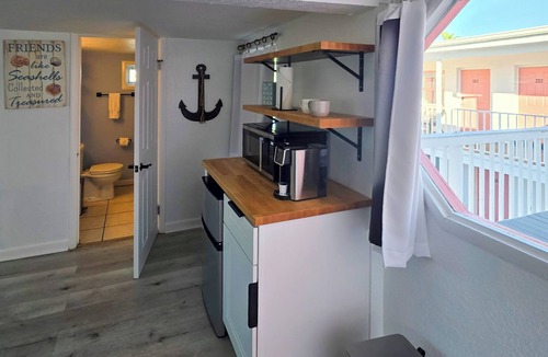 Treasure Island Hotel | Oasis Palms