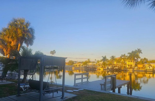 Capri Isle Apartment | Oasis Waterfront Treasure Island Condo with Patio Dock and Johns Pass