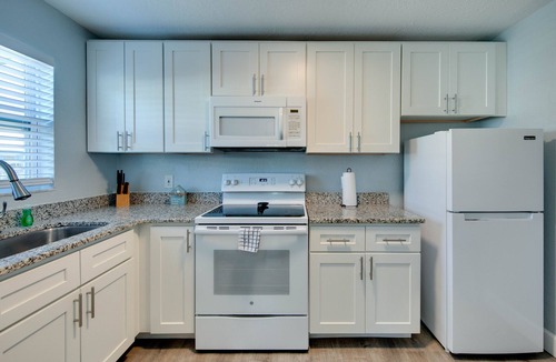 Treasure Island Resort | One bedroom poolside suite. Steps to beach and John’s Pass. HEATED POOL.