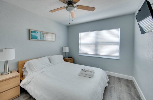 Treasure Island Resort | One bedroom poolside suite. Steps to beach and John’s Pass. HEATED POOL.