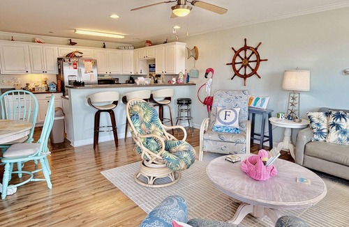 Tranquil Harbour Condo | OW 3201-Flirty Flamingo: Oceanview condo in Oak Island, sleeps 10, pet-friendly.