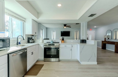 Indian Rocks Beach Cottage | Paradise by the Gulf ~ Unit A ~ 460 steps to the beach - private swim spa home.