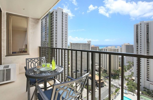 Waikiki Condo | Partial Ocean View, one-bedroom with AC, Wi-Fi, parking, short walk to beach!