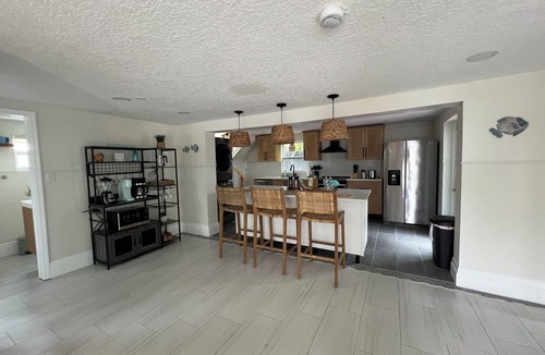 Sunset Beach House | Private Treasure Island Getaway Sleeps 6 Walk to Beach Includes Golf Cart
