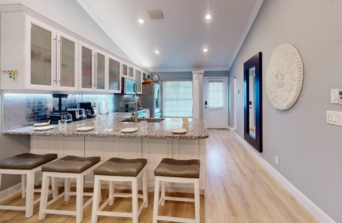 Capri Isle Condo | Quiet Community Just Minutes from Beach. Spacious. Heated Pool. Great Location.