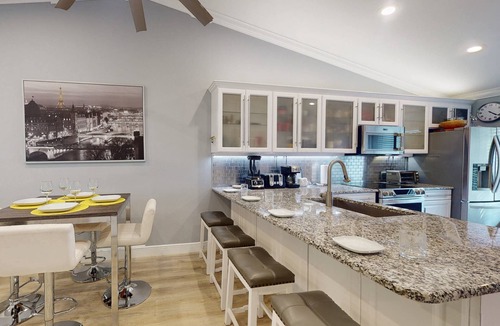 Capri Isle Condo | Quiet Community Just Minutes from Beach. Spacious. Heated Pool. Great Location.