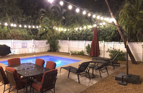 Mid Island House | Rare Find! Sea Breeze Gulf Home. Heated Pool, steps to the Beach.