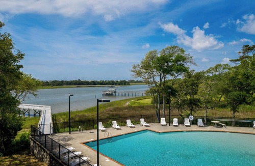 Supply Condo | RELAX in this spacious serene end unit Condo.Pool and dock with club house.