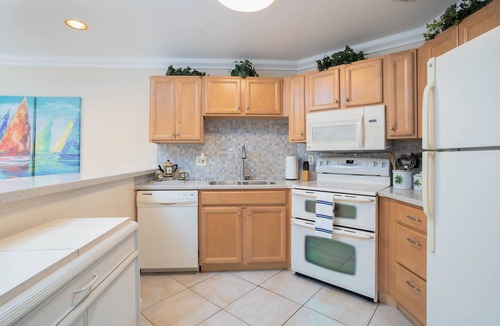Tierra Verde Condo | Renovated 6/2023 Top Floor Balcony Water View 2B/2B, Pool, Hot Tub, Grill, WIFI