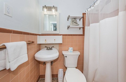 Sunset Beach Hotel | Room 10 · Renovated Boutique Hotel room with a Pool and dock