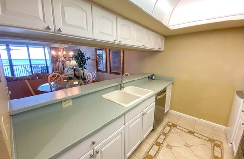 Punta Rassa Condo | Sanibel Harbour Resort Harbour Tower 315: Relaxing while watching for dolphins in the water below.