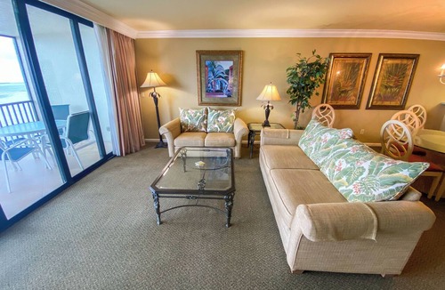Punta Rassa Condo | Sanibel Harbour Resort Harbour Tower 315: Relaxing while watching for dolphins in the water below.