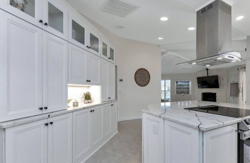 Punta Gorda House | SENSATIONAL! WATER-VIEW, LUXURY REMODEL, SUNNY HEATED POOL, HUGE 145’ SEA WALL