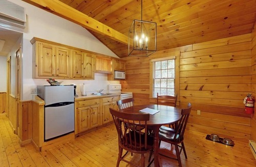 Northport Cabin | Serene two-bedroom dog-friendly cabin getaway with kitchen, fireplace & more