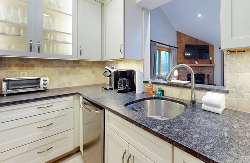 Ludlow Condo | Ski-in/out condo with water & mountain views, private sauna & fireplace