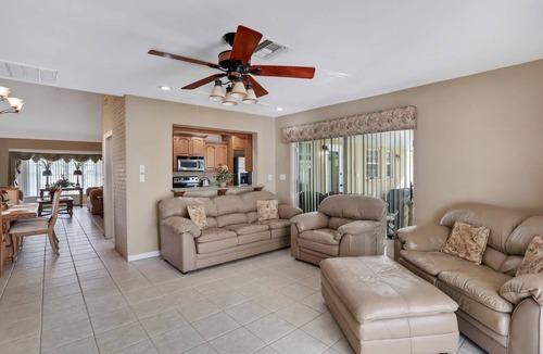 Harbor Hills House | Snowbird friendly elegant home with waterfront location pool grill fireplace