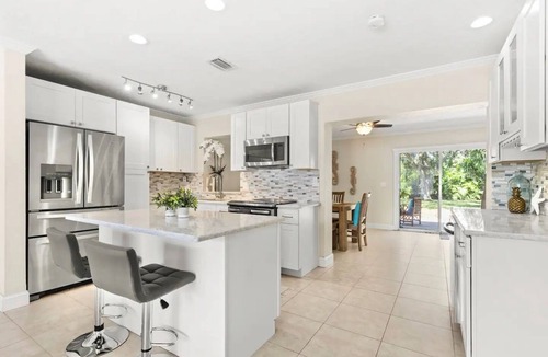 Seminole House | Spacious Relaxing Pool Home Huge Fenced-In Yard