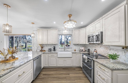 Temple Terrace House | Stunning Gem Home w/Heated Salt Pool & Game Room