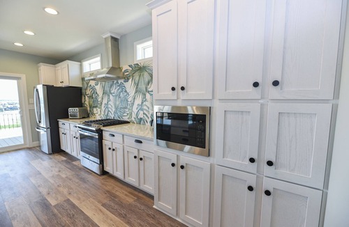 Long Neck House | Stunning-waterfront, beach, pools, family fun