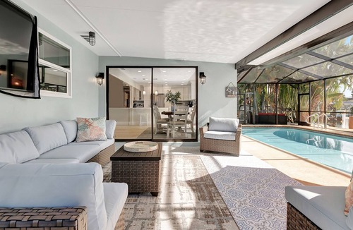 Harbor Hills House | Stunning Waterfront home | Heated Pool | Private Dock | Minutes to Beaches