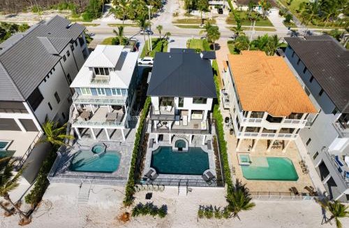 Bonita Springs House | Sunset Beach, Modern, Luxury Beachfront Pool Home, Sleeps 12