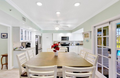 Lakeview Village House | The Oak house. HEATED Pool. Waterfront. Fire pit. Swings