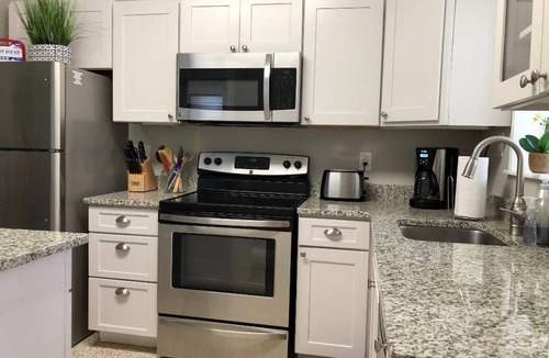 Ridge Wood Heights House | The Oasis-Private Heated Pool, Hot Tub, Outdoor living space-5mi to beach