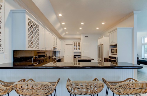 Belleair Beach House | The Pink Palace- Gulf front townhouse with private pool & large patio, sleeps 12